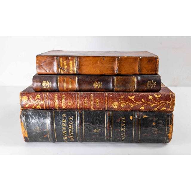 We are selling this mid-century faux leather book box for hiding things. This great decorative piece features old leather...
