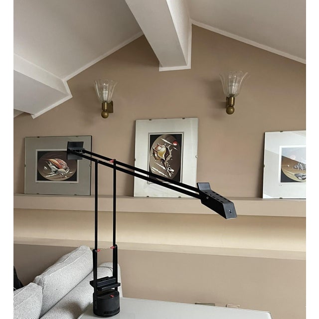 An elegant vintage Art Deco wall light, featuring a refined and functional design that combines the sophisticated...