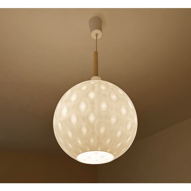 Very large mid century pendant light with a gourd shape glass shade with a semi translucent "golf ball" pattern, gilded...