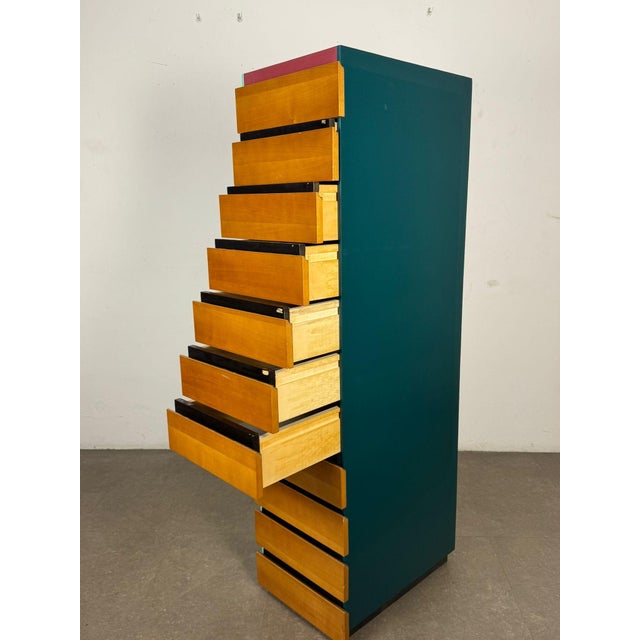 Postmodern Chest of Drawers, 1990s, in Restored conditions. Designed 1990 to 1999 This piece is designed in the style of...