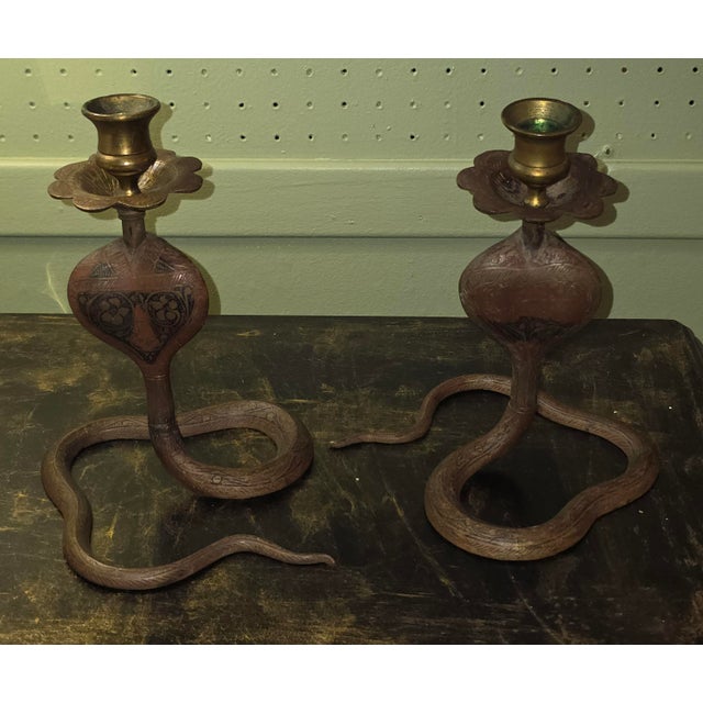 Beautifully aged patina vintage brass cobra candlesticks, mid 20th century or earlier, a unique addition to any decor,