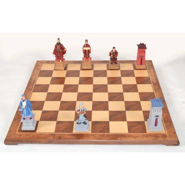 This theme chess set includes the Ancient Chinese 32 hand painted theme chess pieces matched with a Walnut and Maple...