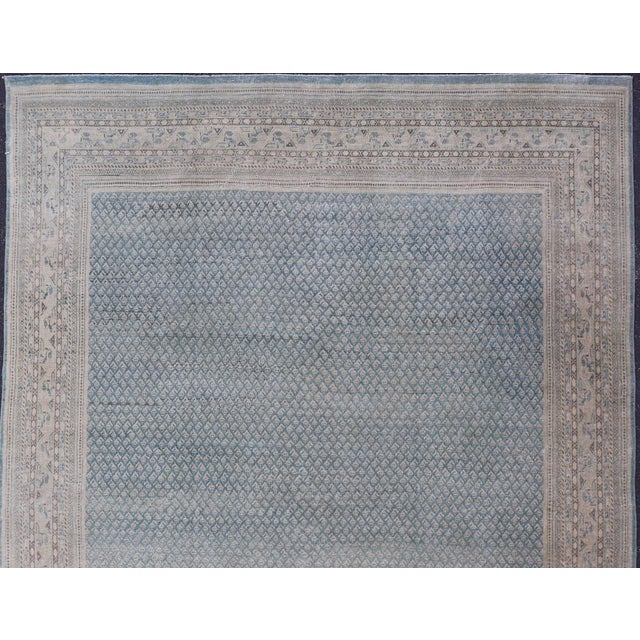 Measures: 8'7 x 11'9 Antique Persian Tabriz Rug with Soft Light Blue Field and Fine Allover Design. Keivan Woven Arts/...