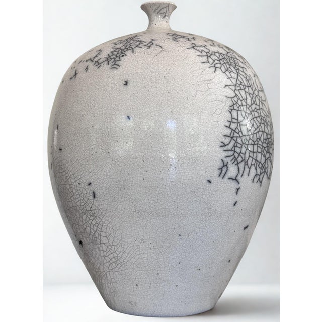 Val's Dollhouse is proud to present this white raku technique museum quality vase by renowned master potter, Nancee Meeker...