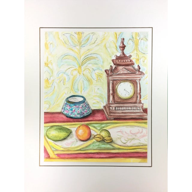 French watercolor of a vibrantly colored still life featuring an ornamental mantel clock and fruits, circa 1960. Original...