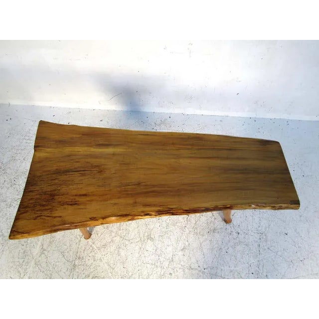 This one of a kind coffee table is perfect for any small living room or accent room. Made from maple wood this piece...