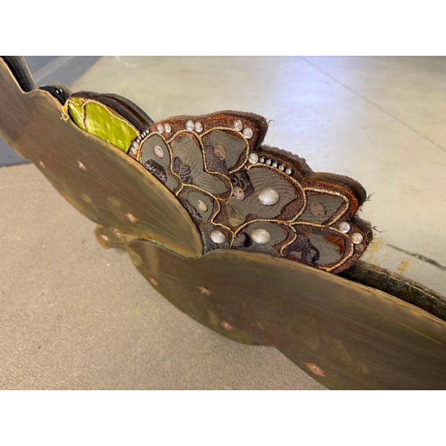 Gorgeous hammered brass wall mirror with a floral design. Beautifully hand made mirror of which you probably wont find...