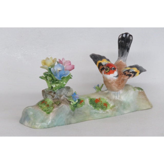 This beautiful Bird Figurine is made of porcelain and is hand painted. This darling figurine was made in England by Crown...