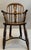 Elm and Yew Wood Child's Windsor Armchair. Single "Windsor" Armchair made predominantly of yew wood with figured elm seat....