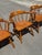 This is a set of Vintage Ethan Allen Dining Chairs in a Traditional, Colonial Style. All chairs feature golden maple wood...
