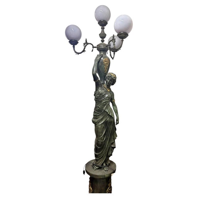 Pair of Art Deco Lamps, Early 20th Century, H: 260cm Sculptural floor lamp depicting a classical female figure holding an...