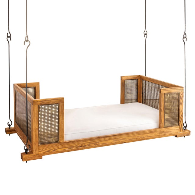The Cane Hanging Day Bed offers a unique lowcountry style to accent your front porch. Inspired by the south's love of the...