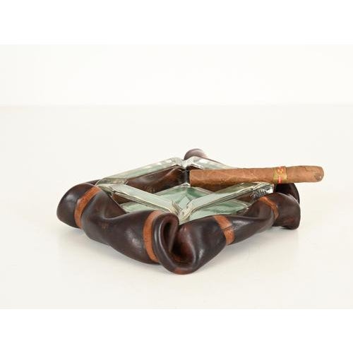 Gorgeous and unique Mid-Century Italian ashtray in thick curved leather and crystal glass. This incredibly elegant piece...