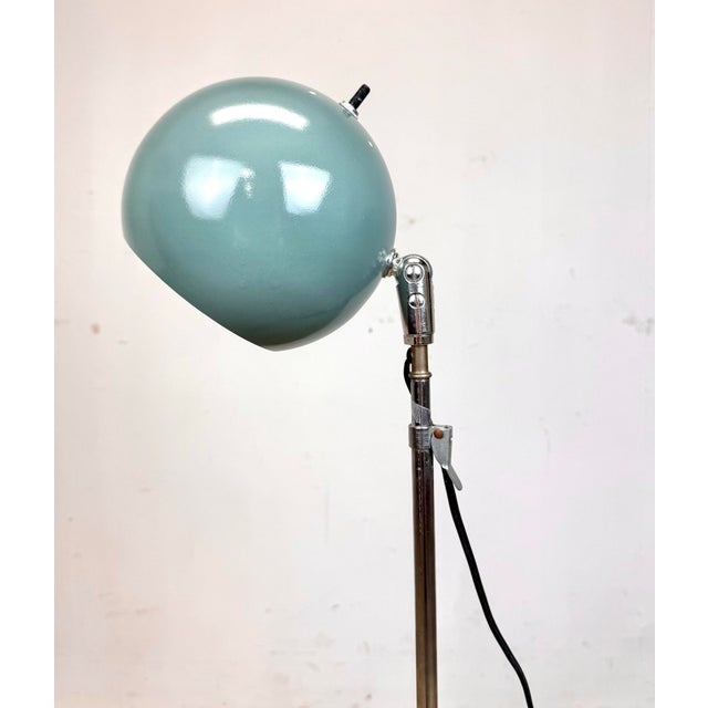 A cool Sonneman style eyeball adjustable/collapsible tripod base floor lamp, circa 1960’s. Adjusts from 54” to 36” tall....