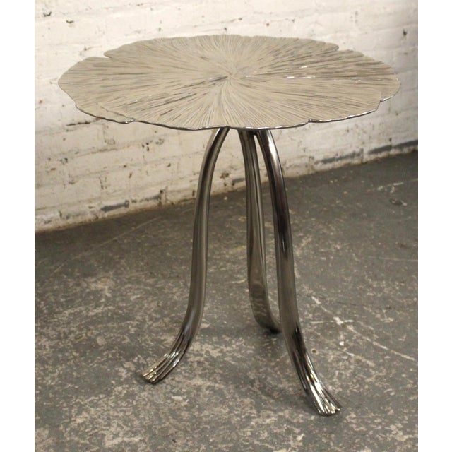 The Annabella side table by Bernhardt Interiors features a wonderful all metal design with a ginko leaf as the table top...