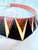 This artisan‑made choker and bracelet set is hand‑crafted from solid rosewood with contrasting ebony and pale hardwood...