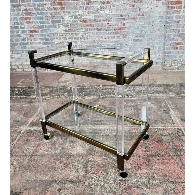 Vintage Mid century Brass & Lucite Bar Cart size 34 x 18 x 32F" A beautiful piece that will add to your décor!