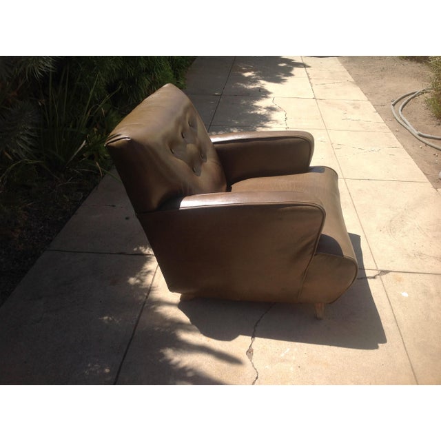 Modern mid century leather lounge chair. Chair was upholstered by our shop in green top grain leather. Legs are oak. Chair...