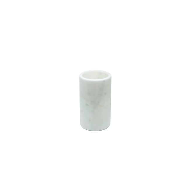 This white Carrara marble utensil holder was made in Italy. Each piece is unique, as every marble block has various shades...