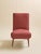 These vintage slipper chairs features a high upholstered back, rounded seat, and slim tapered wood legs. The rust-toned...