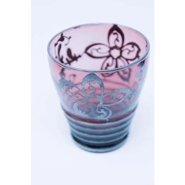 Amethyst enameled Bohemian glass liquor set or aperitif service of seven pieces, comprised of a decanter and six glasses....