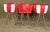 Fun red and white stools on sturdy metal frames with footrests. Please confirm location.
