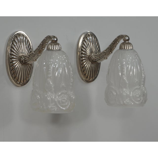 Hettier & Vincent - Baccarat A wonderful pair of 1925-1930 French art deco wall sconces in nickel plated bronze and...