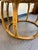 This mid-century coastal style round coffee table blends natural materials with elegance. Made with woven, natural rattan,...