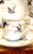 Experience tea-time with 4 teacup sets featuring hand-painted ducks in flight. This antique collection, including a...