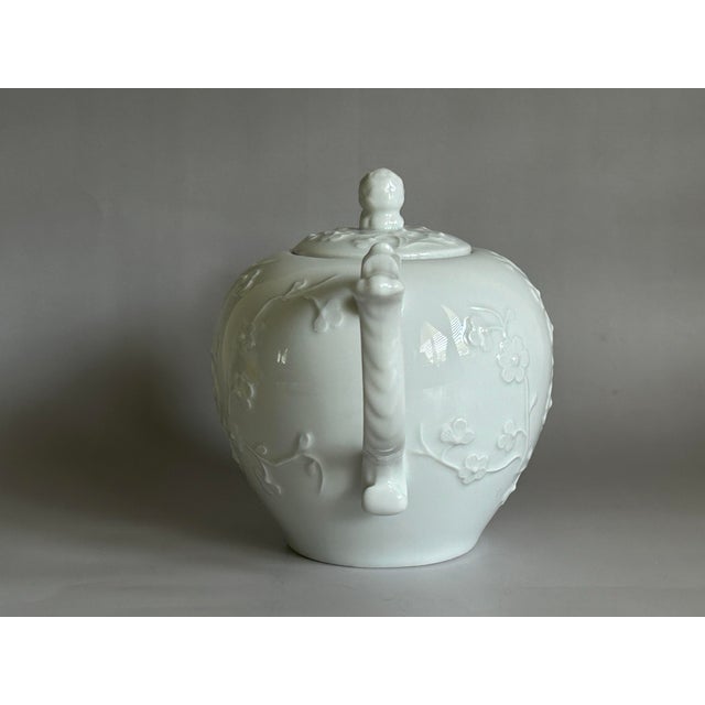 Offered here is a vintage Blanc de Chine Asian-style teapot, produced in Portugal for the Metropolitan Museum of Art (MMA)...