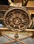 Metal Vintage Brass & Glass Console Table – Ornate Metal Base With Floral Medallion Detail For Sale - Image 7 of 10