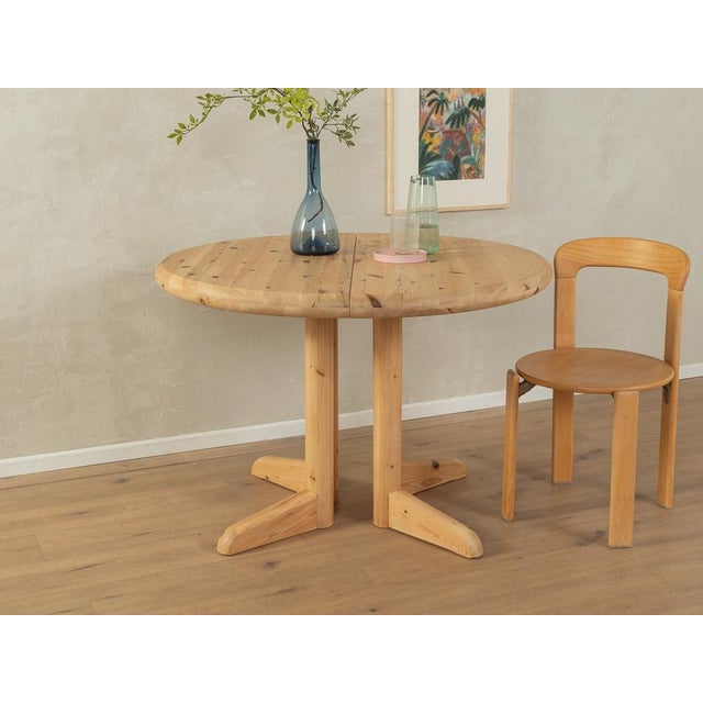 Classic dining table from the 1970s. High-quality frame and tabletop made of solid pine. Quality features: Excellent...