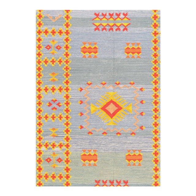 This Moroccan-design flat weave rug is reversible for a little extra dose of versatility. Naturally dyed, this rug hails...