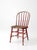 This antique Windsor spindle-back chair features a beautifully aged red finish, a natural wood seat, and distinctive...