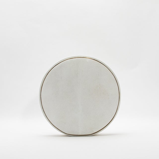 This exquisite vase by R&Y Augousti captures the essence of artisanal craftsmanship with its luxurious shagreen surface,...