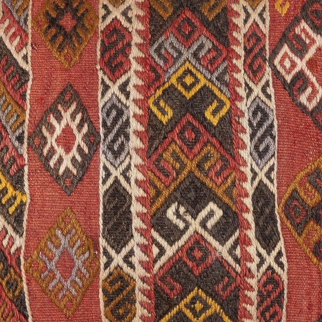 Add a touch of history and warmth to your space with this vintage handmade Turkish wool kilim cushion cover. Crafted from...