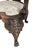 The front cabriole legs having very ornate face masks. The arms supported by eagle figures. Arms and back decorated with...