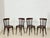 For sale: a set of four beautiful, classic wooden chairs in a timeless bistro or Viennese Workshop style. The chairs...