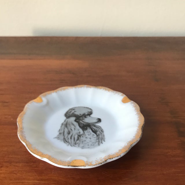 We love this funky little poodle dish. While it was originally an ashtray, we think it would look fabulous on a bedside...