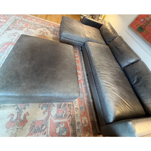 Leather sectional with great patina. Love this couch and ottoman! Get high-end Pottery Barn quality without the retail...