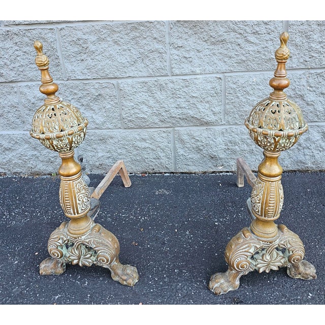 19th Century Dutch Rococo Style Brass Andironsns. They stand 22 1/2" tall and measure 10.5" across the feet and are 18" in...