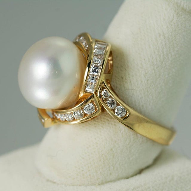 18KRing with 12.5mm button South Sea Pearl and 0.78 carats of diamonds 8.35 grams size 7