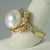 18KRing with 12.5mm button South Sea Pearl and 0.78 carats of diamonds 8.35 grams size 7