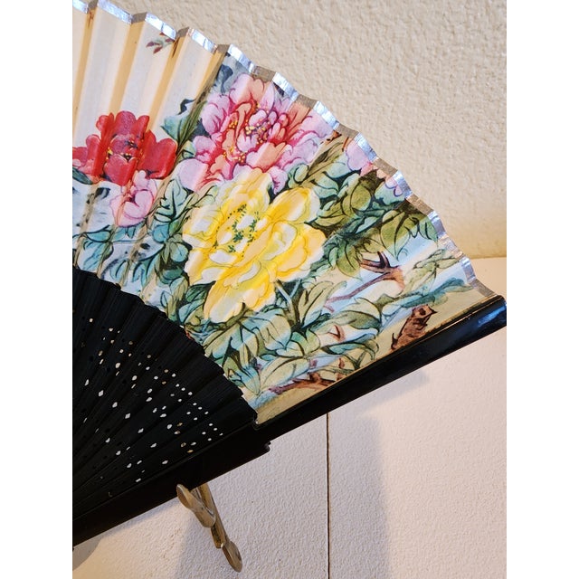 Nice fan with the flowers and colors.