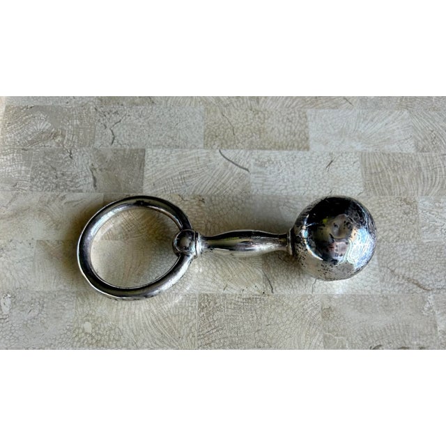 Marks: Marked to the handle Tiffany & Co / Sterling / 925. - Measurements: Length: 5 in. Width: 2 1/8 Lovely rattle tone....