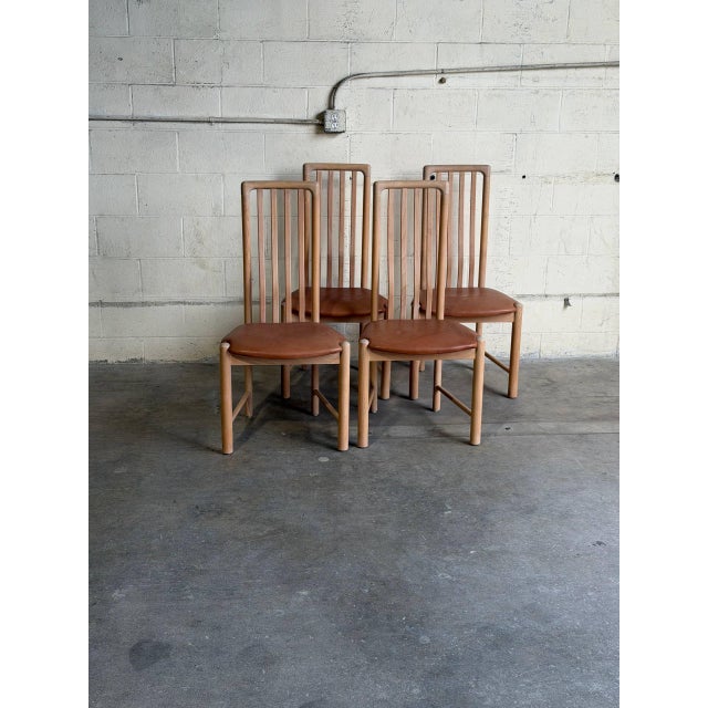 Beautiful set of 4 Danish modern dining chairs manufactured by Kvist in Denmark. Crafted from solid bent beechwood, these...