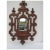 Beautifully carved walnut mirror and hat-rack, in great condition. Nicely shaped beveled mirror. Height: 48" Width: 30"