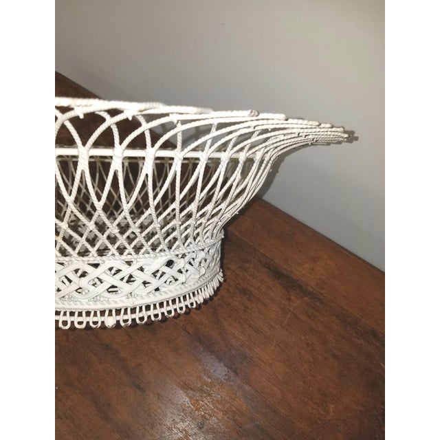 Wonderful old wireware basket. Perfect for a fruit basket or cachepot. Probably French.