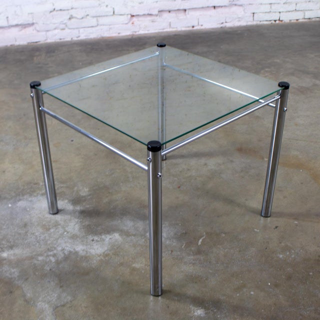 Classic 1970’s Modern square end or side table by James Davis Furniture composed of a cylindrical chrome tube frame &...