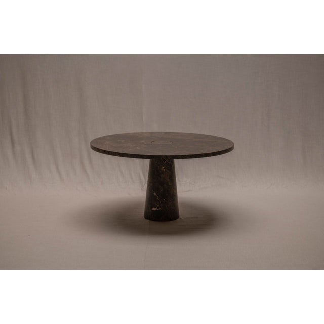 An iconic ‘Eros’ dining table designed by Angelo Mangiarotti for Skipper in 1971. Crafted entirely in rich brown marble...